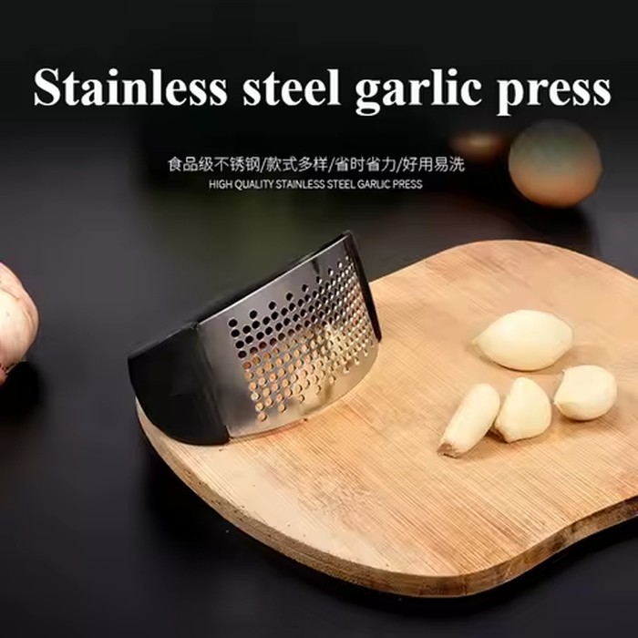 Stainless steel arc garlic press manual plastic handle garlic paste household garlic press artifact