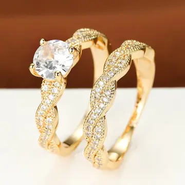 Simple Golden Four-claw Round Cross Twist Ring